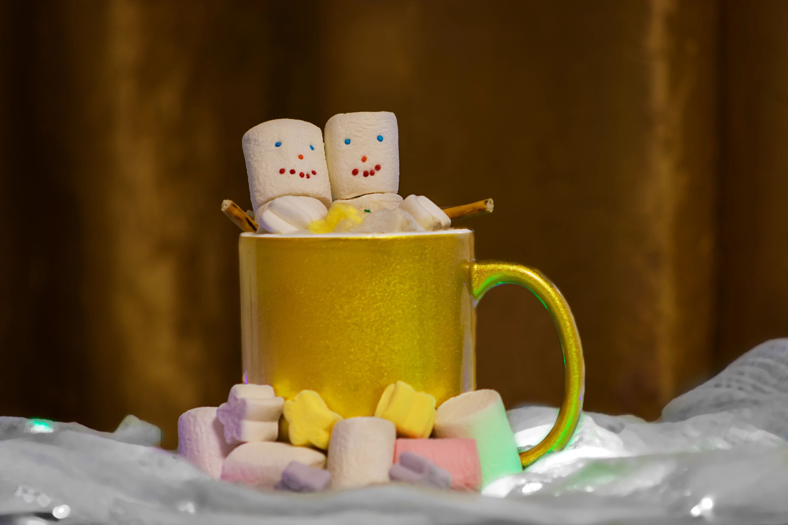 Cup of hot cocoa with marshmallow snowman