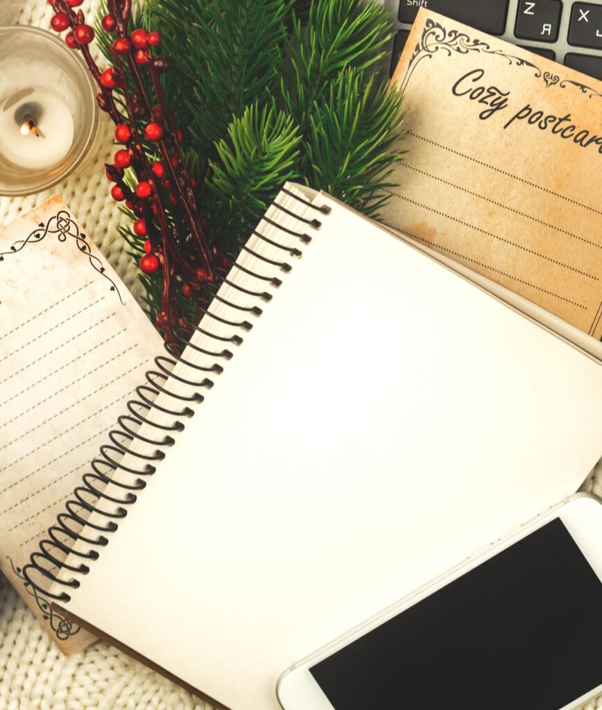 Cozy mockup design, flat lay winter composition with copy space, notepad and postcards with decorations, for bloggers