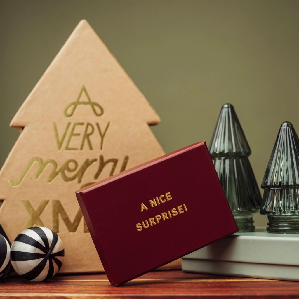 Christmas still life with gift boxes and decorative christmas ornaments