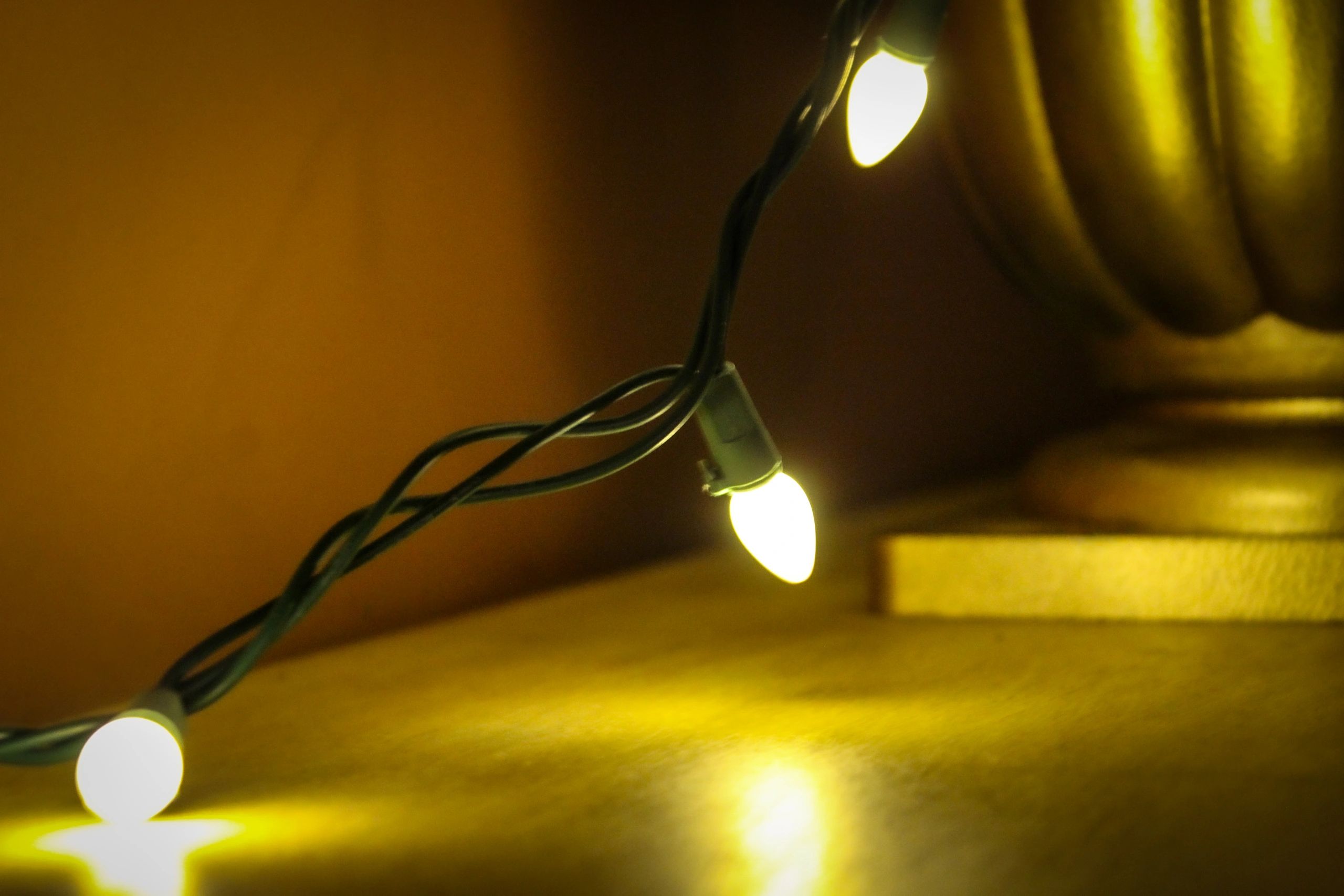 Golden holiday lights close up